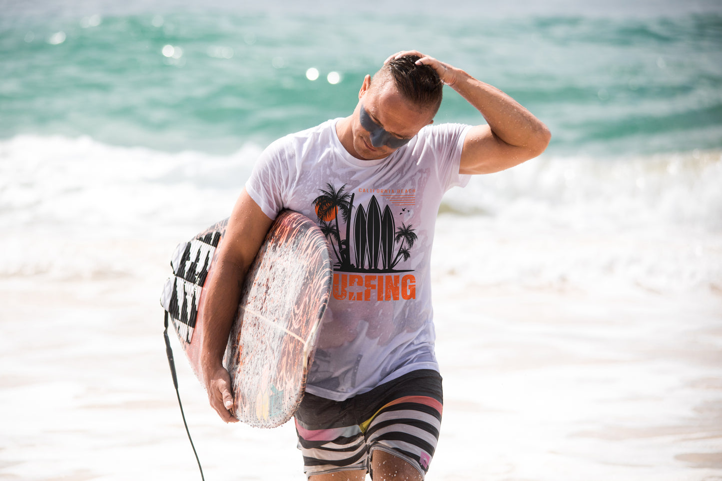 Access Travel "Surfing" Beach Palm Tee